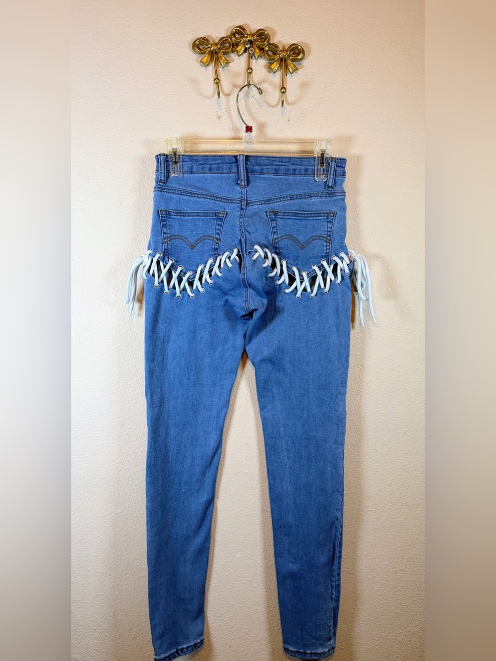My Boo Skinny Jeans with White Lace-Up Back Detailing. Size S